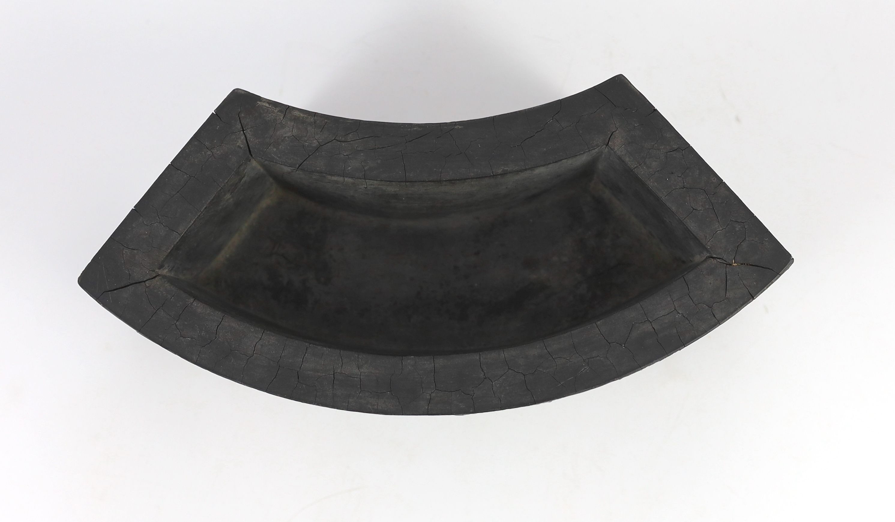 A Chinese compressed ink block in the form of a flower pot, Ming mark, Qing dynasty, 25 cm wide